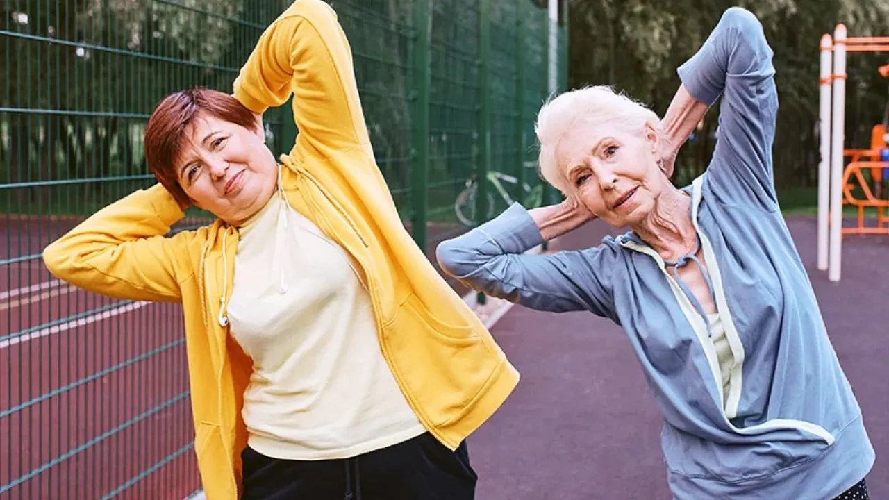 Person practicing yoga indoors in a calm, focused environment with soft lighting.
